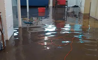 Basement with boiler, cabinets and washing machine completely flooded in Fort Worth, TX